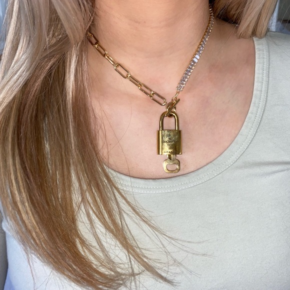 Louis Vuitton Jewelry - Authentic Louis Vuitton lock and key on a beautiful two different part chain.